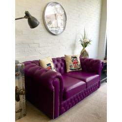 Stunning purple SAXON Chesterfield sofa. Can deliver