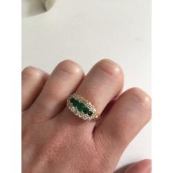 18ct yellow gold, emerald and diamond half hoop cluster ring.