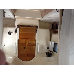 25 ft medusa bilge keel yacht . Wide beam with good headroom .