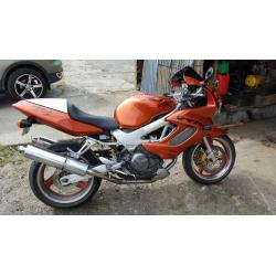 cheep first big bike !!! honda VTR 1000 in candy orange part x 1200 harly with EFI engine or why