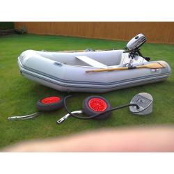 Avon inflatable dinghy with marina outboard engine