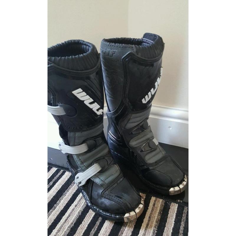 Kids motocross accessories. Wulf boots size 2, body armour top and helmet.