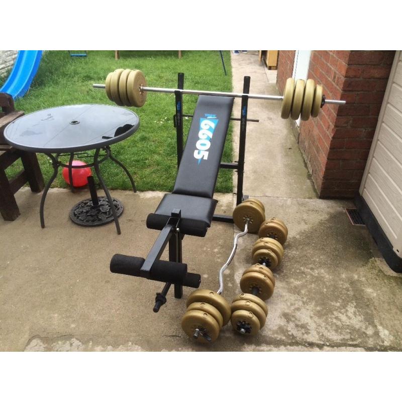 YORK WEIGHTS BENCH WITH BARBELL, CURLING BAR, SET OF DUMBELLS AND 73KG OF YORK WEIGHTS
