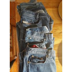 Assortment of designer jeans