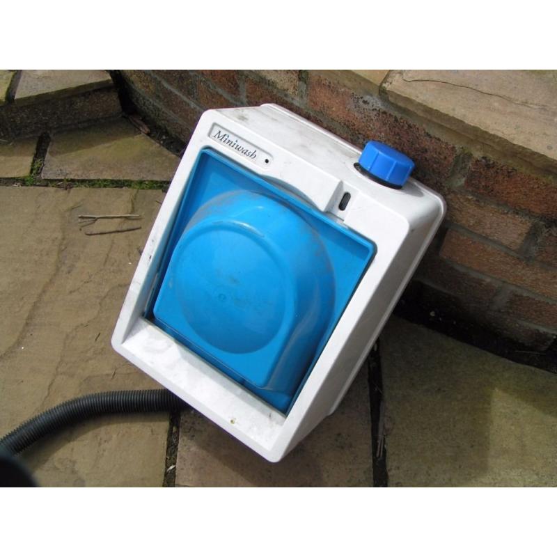 Heated water hand wash container