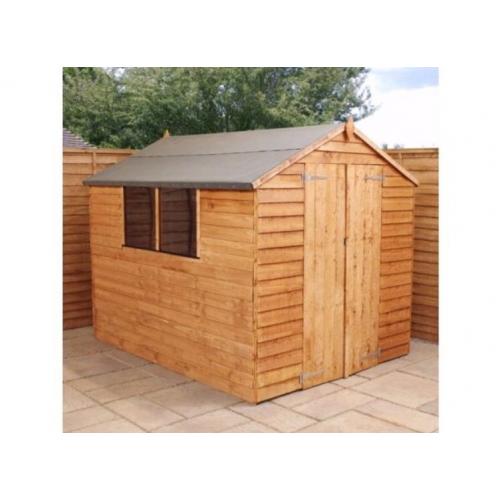 Sheds in many styles and sizes ,summerhouses, delivered, assemble with a base and treated