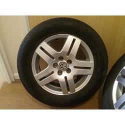 Genuine vw alloy wheels with nearly new tyres