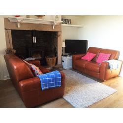 2 leather barker and storehouse sofas