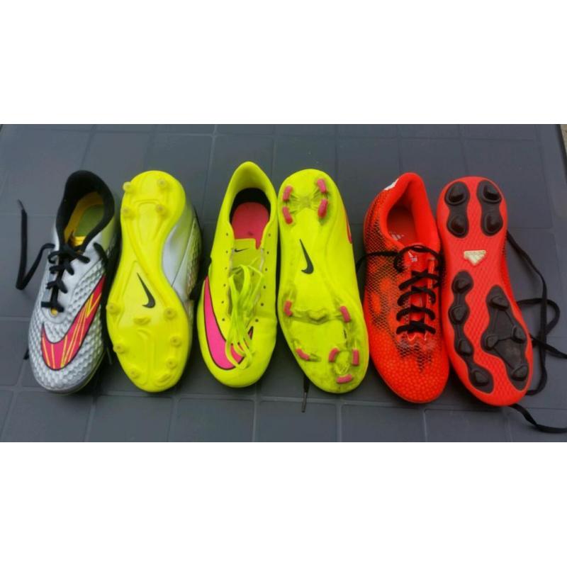 3 pairs of football boots