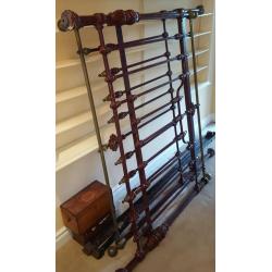 Victorian/Edwardian cast iron and brass double bed frame.