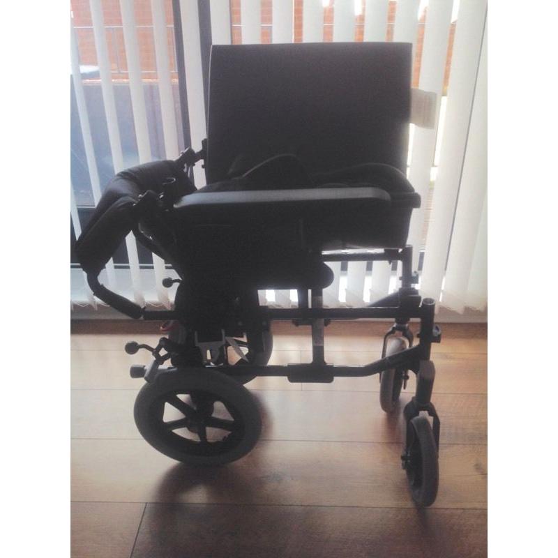 Folding travel wheelchair NEVER USED
