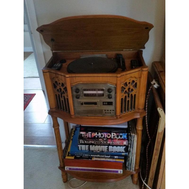 Record player/radio/3 cd player. Antique style. Perfect condition.