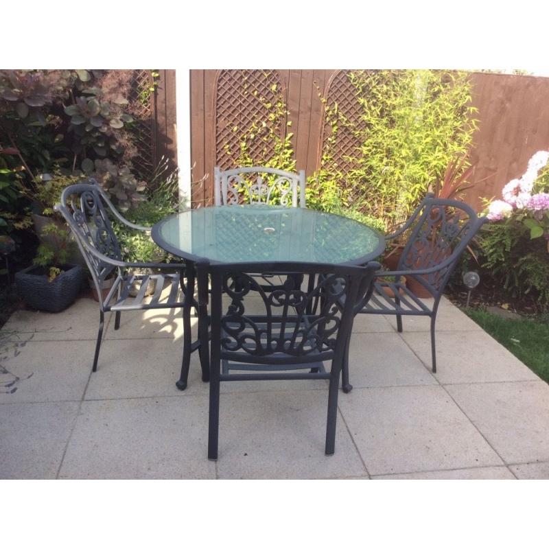 Garden Patio set glass topped table and 4 chairs metal green resin covered