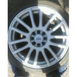 Four Ford alloy wheels