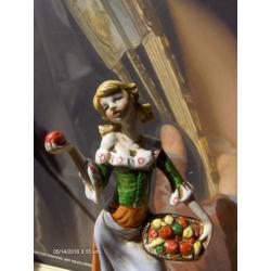 vintage figure ,European girl selling fruit