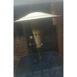 Patio heater with full gas bottle