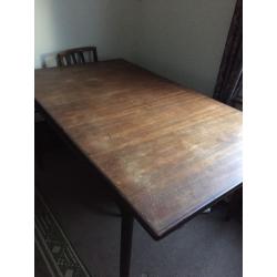 Dark wooden table for sale, extendable from sides