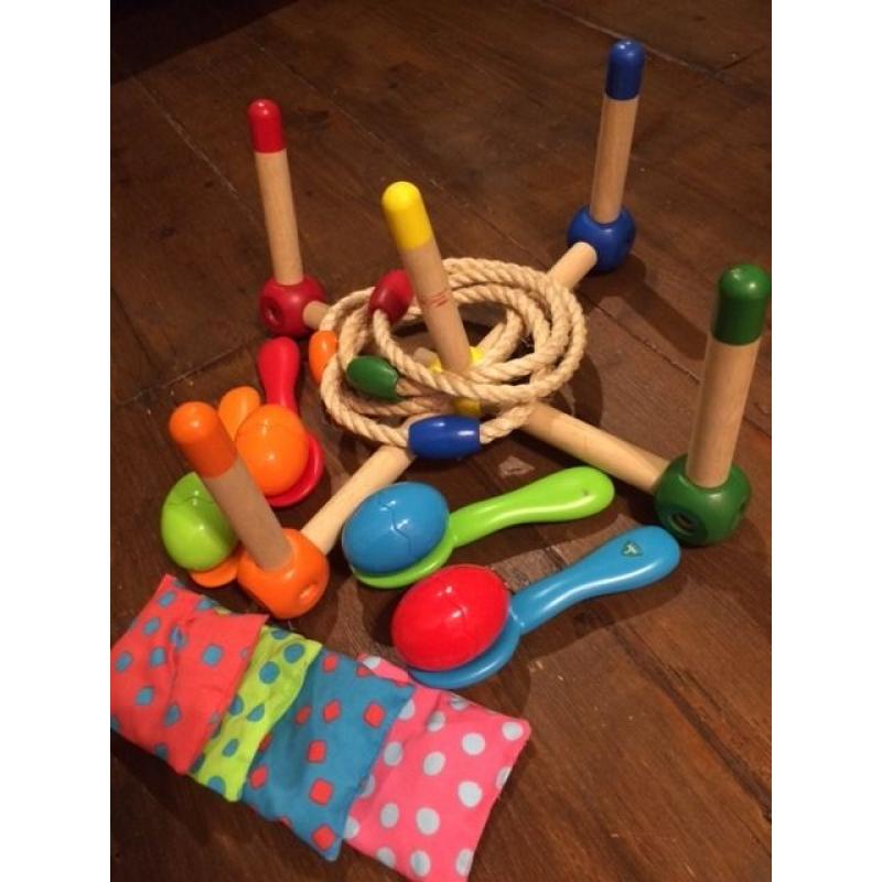 Various ELC outdoor games including rope quoits & wooden pegs