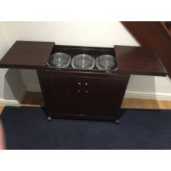 HOSTESS TROLLEY, HEATED FOOD TROLLEY FOR ENTERTAINING, LOOKS LIKE MAHOGANY VERY GOOD CONDITION
