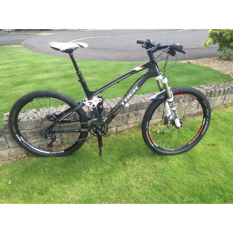 Trek Fuel EX 9.7 carbon full suspension mountain bike. Very clean, with dropper post & hope wheel.