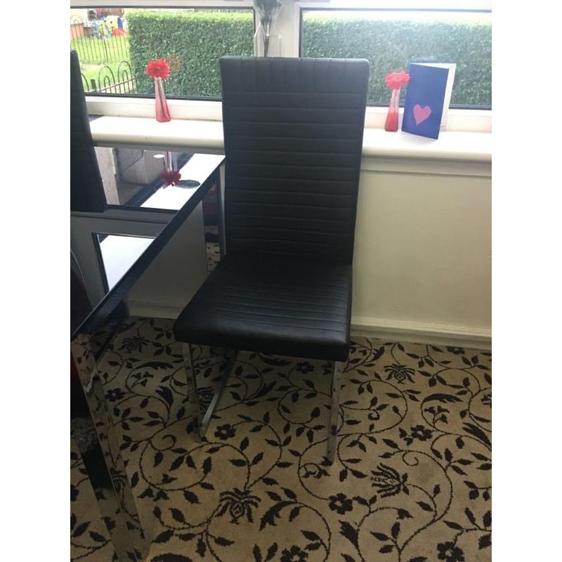 Black glass dining table