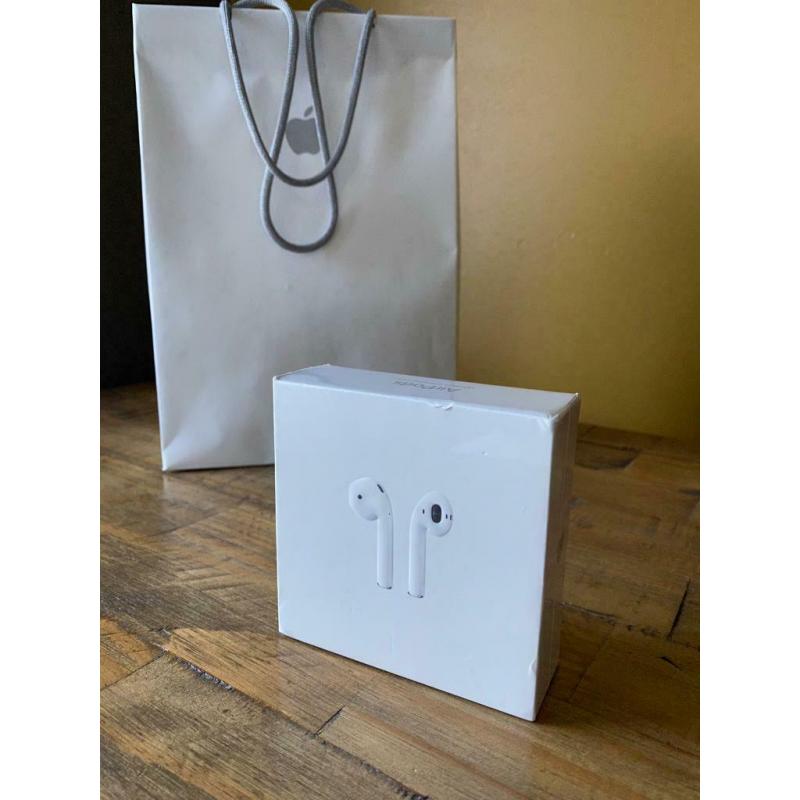 Apple AirPods 2nd Generation with wireless charging case. New and Sealed.