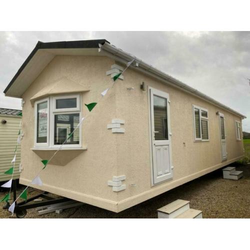 Rough cast chalet mobile home for sale off site