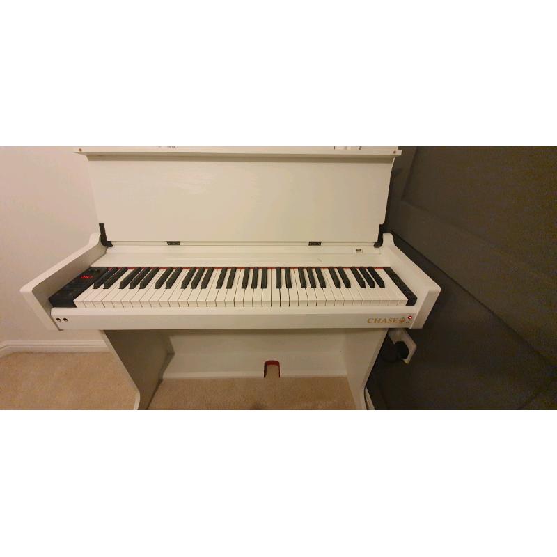 Chase white digital piano perfect for kids christmas or beginners