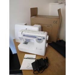 Sewing machine, near new, Silver model 2003
