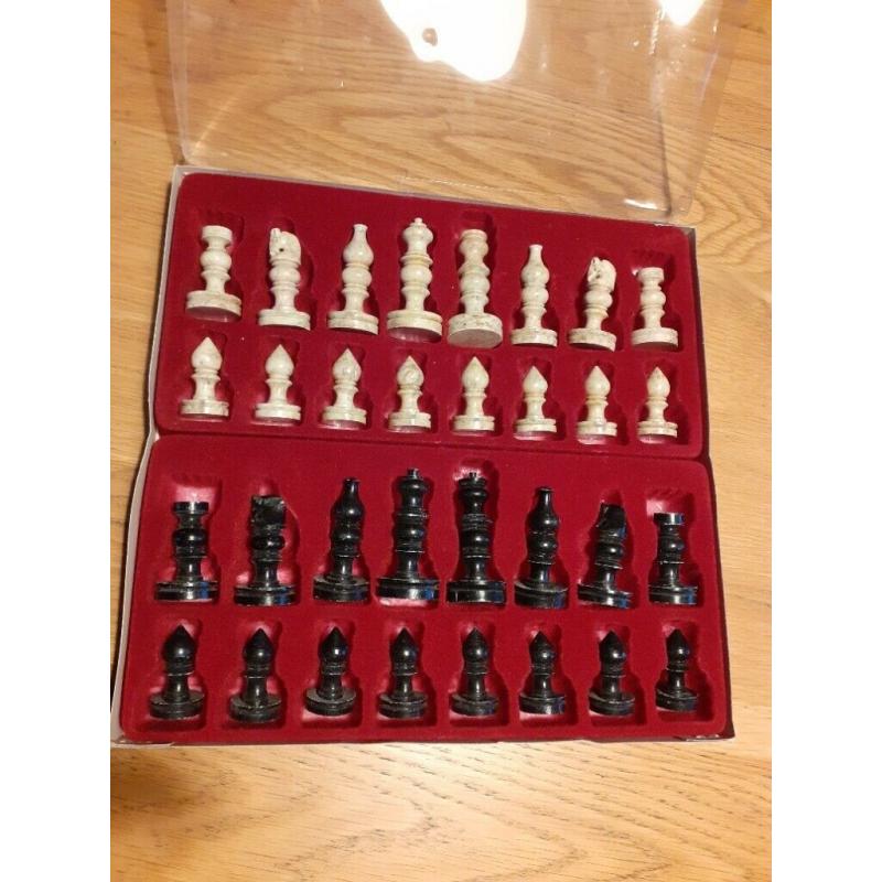 Chess figures carved from stone for sale